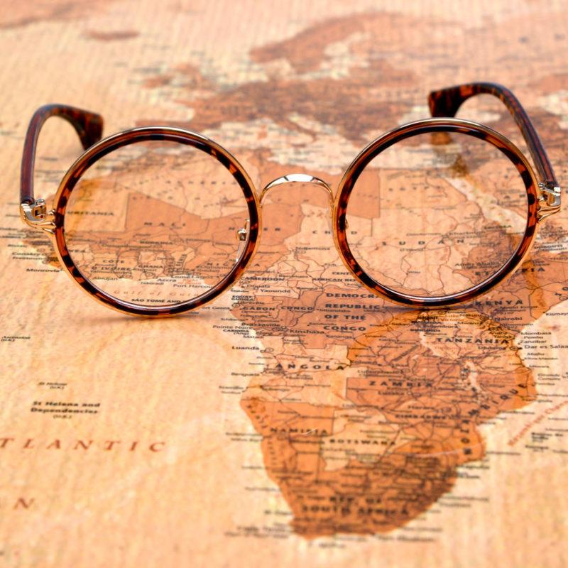 34151666 - glasses on a map of a world - africa
