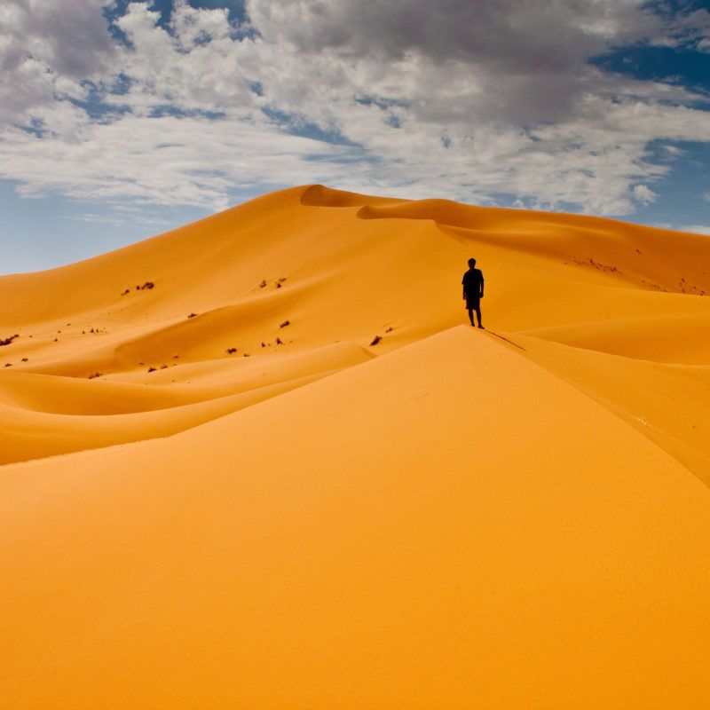 34303362 - man lost in desert dunes