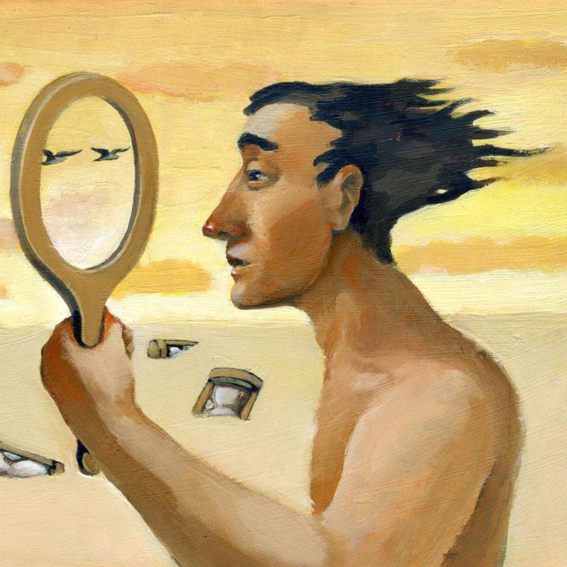 39651529 - a man looking through an empty mirror and sees the landscape around him