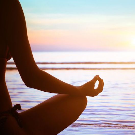20489127 - serenity and yoga practicing at sunset, meditation