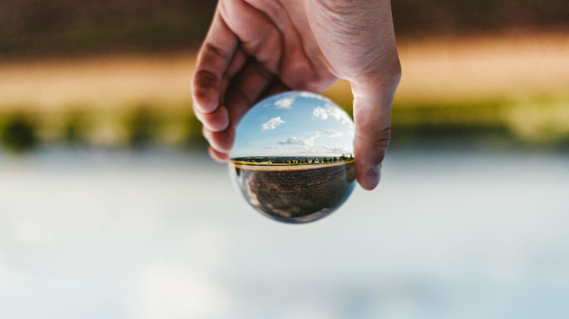 Opposite thinking seen through a glass ball