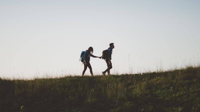 Couple in an authentic relationship hiking