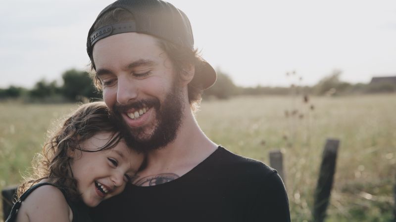 Father and daughter enjoying little things